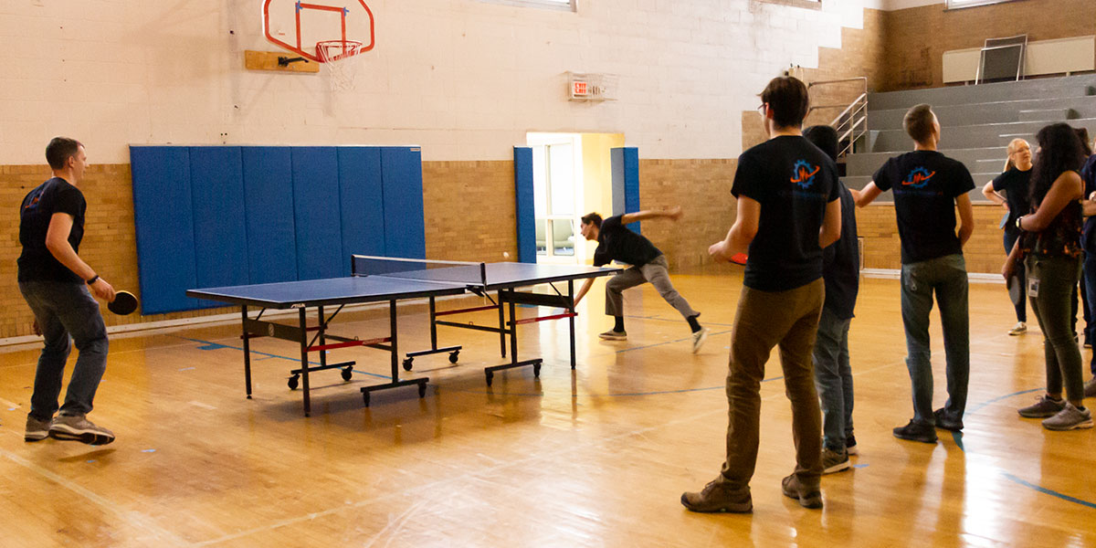Engineers playing ping pong